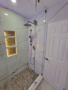 the centerpiece of this bathroom is undoubtedly the custom designed, 4 piece glass shower enclosure